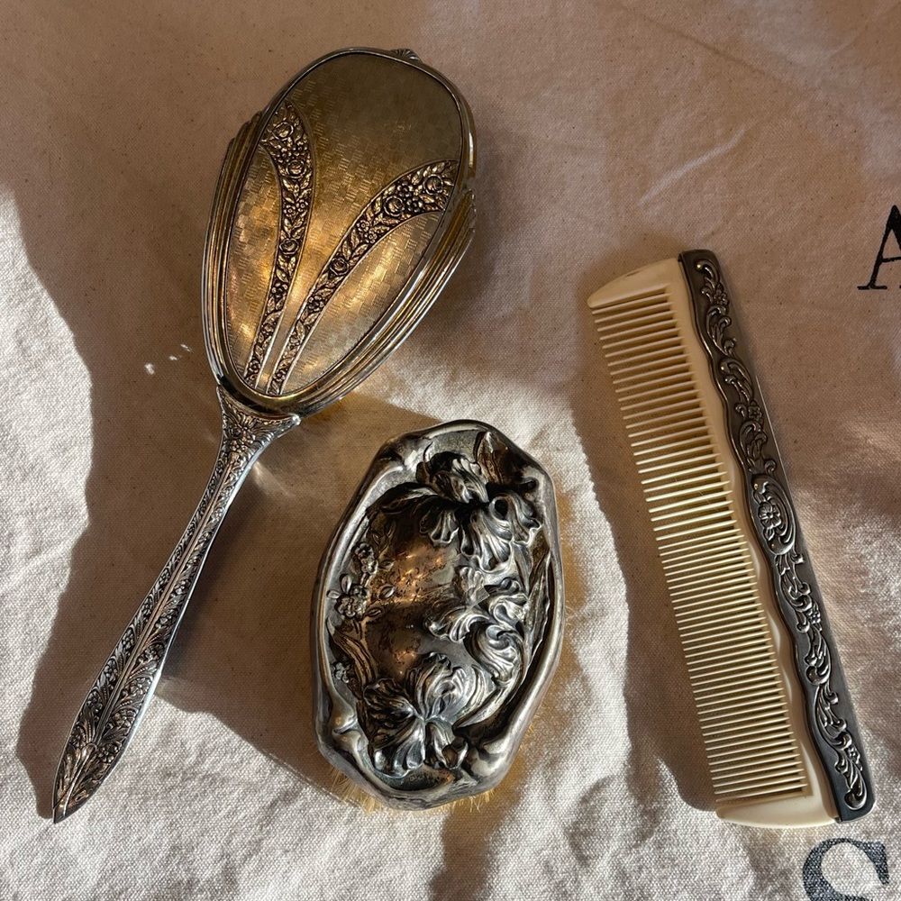 Vintage silver plate vanity items, brushes and comb
